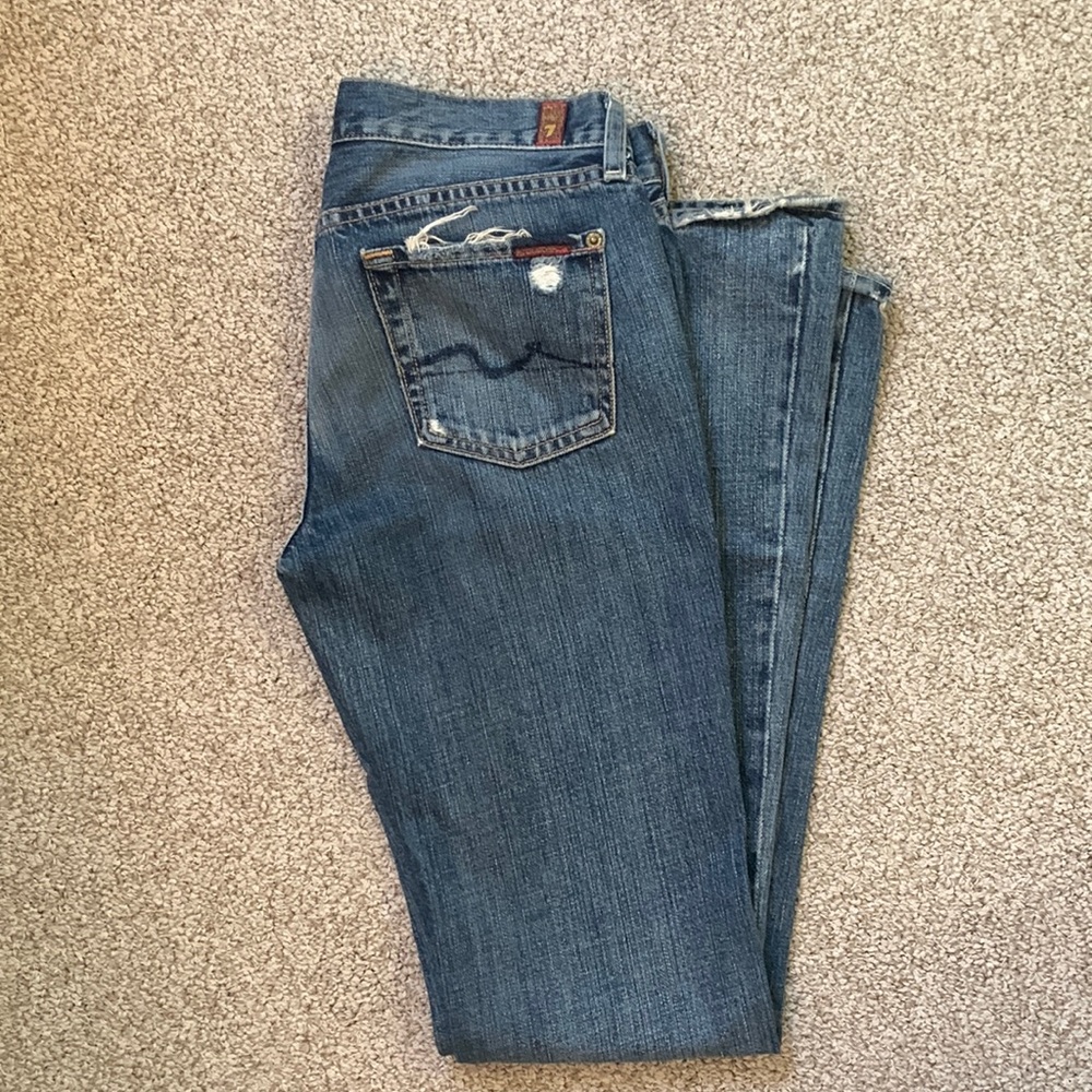 Distressed bootcut jean